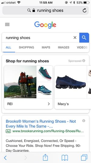 Google search of running shoes displaying shopping showcase ads